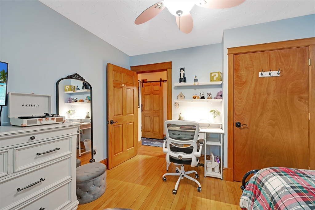 156 Olean Street Worcester, MA 01602 - Photo 21 of 37 a room with a bed and furniture