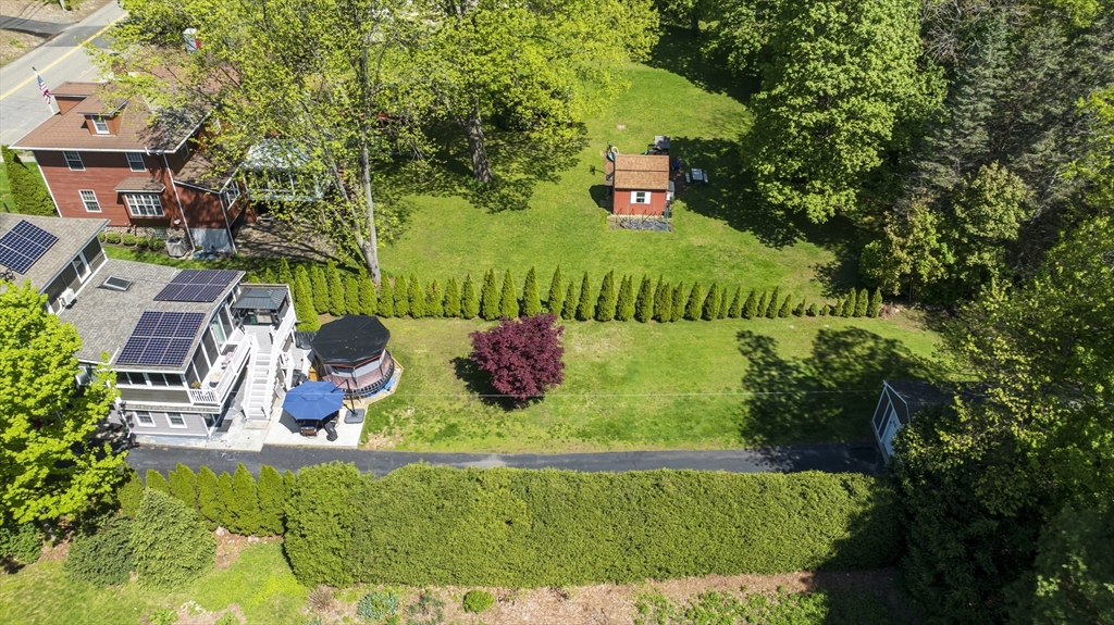 156 Olean Street Worcester, MA 01602 - Photo 33 of 37 a backyard of a house with lots of green space
