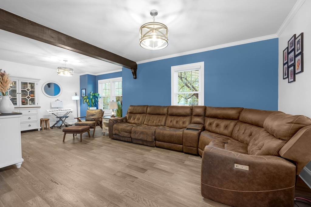 156 Olean Street Worcester, MA 01602 - Photo 4 of 37 a living room with furniture and a large window