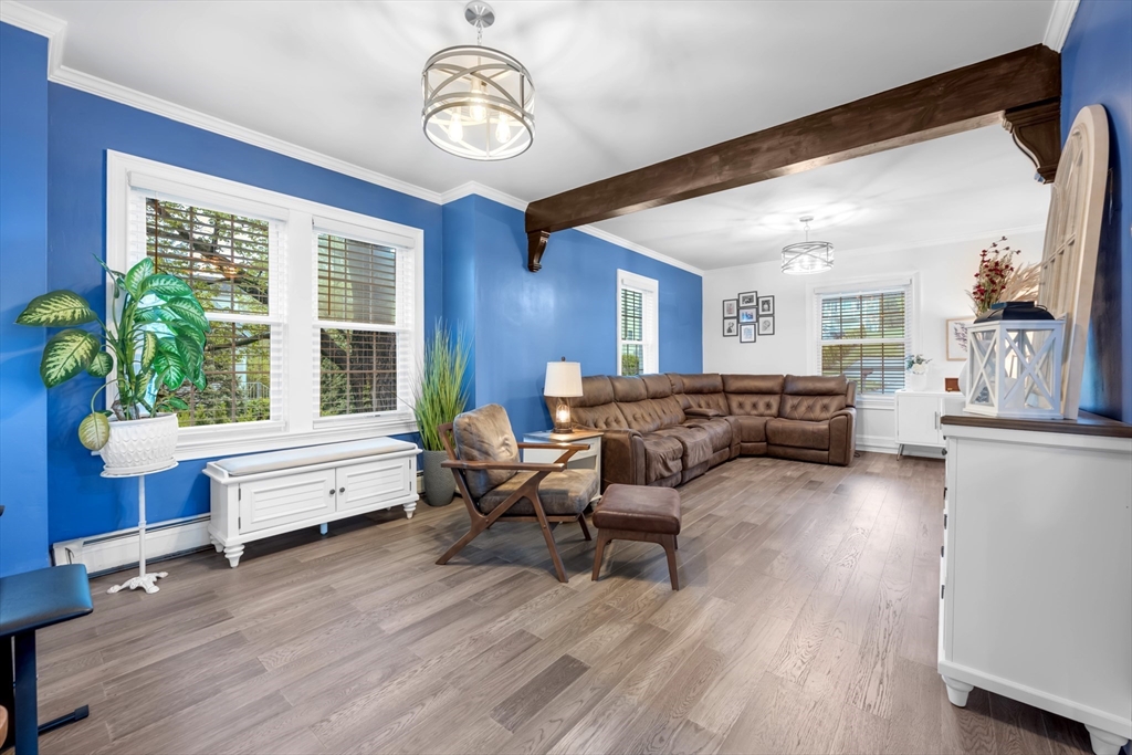 156 Olean Street Worcester, MA 01602 - Photo 6 of 37 a living room with furniture and a large window