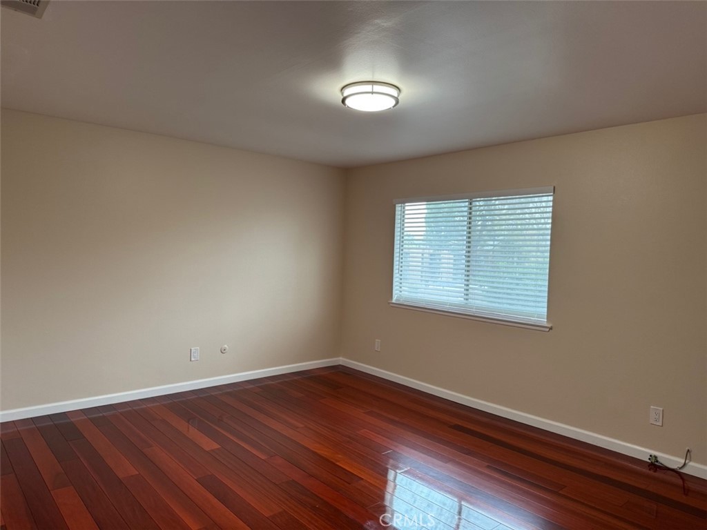 1115 Clark Street Riverside, CA 92501 - Photo 12 of 24 a view of a room with wooden floor and windows
