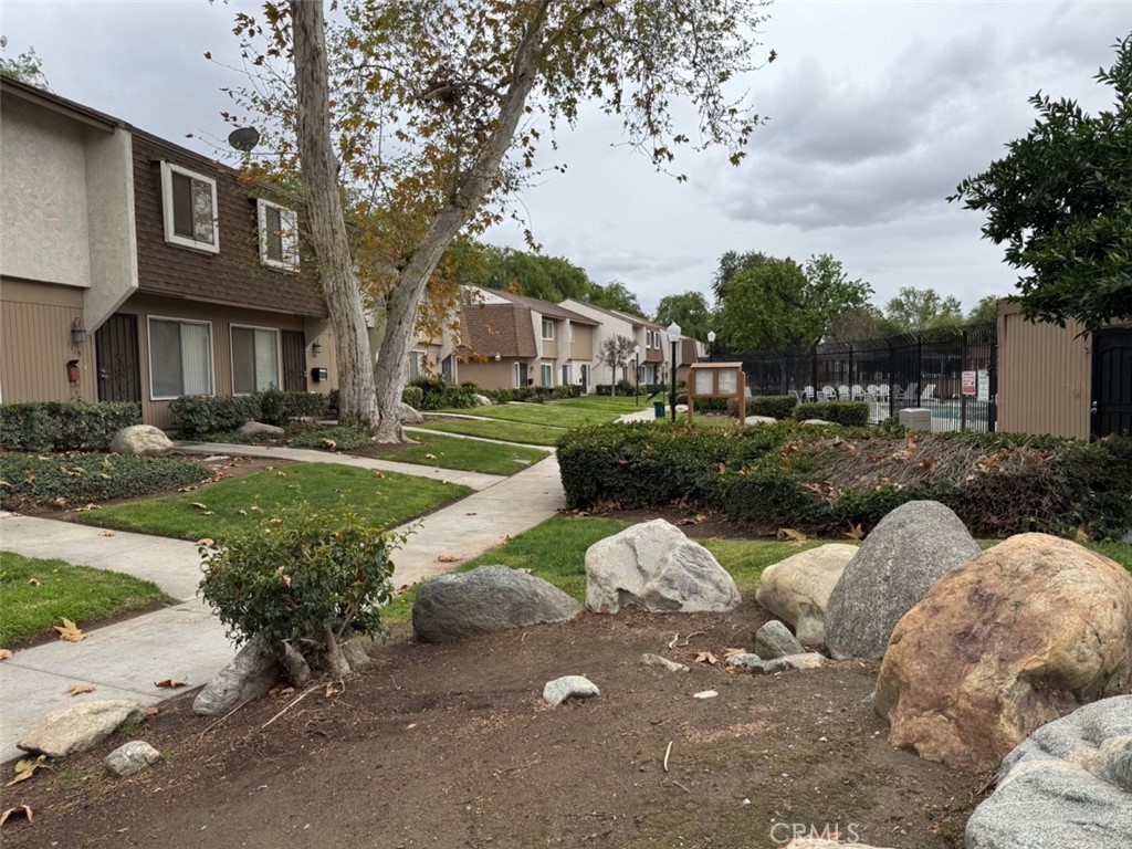 1115 Clark Street Riverside, CA 92501 - Photo 18 of 24 a front view of a house with garden