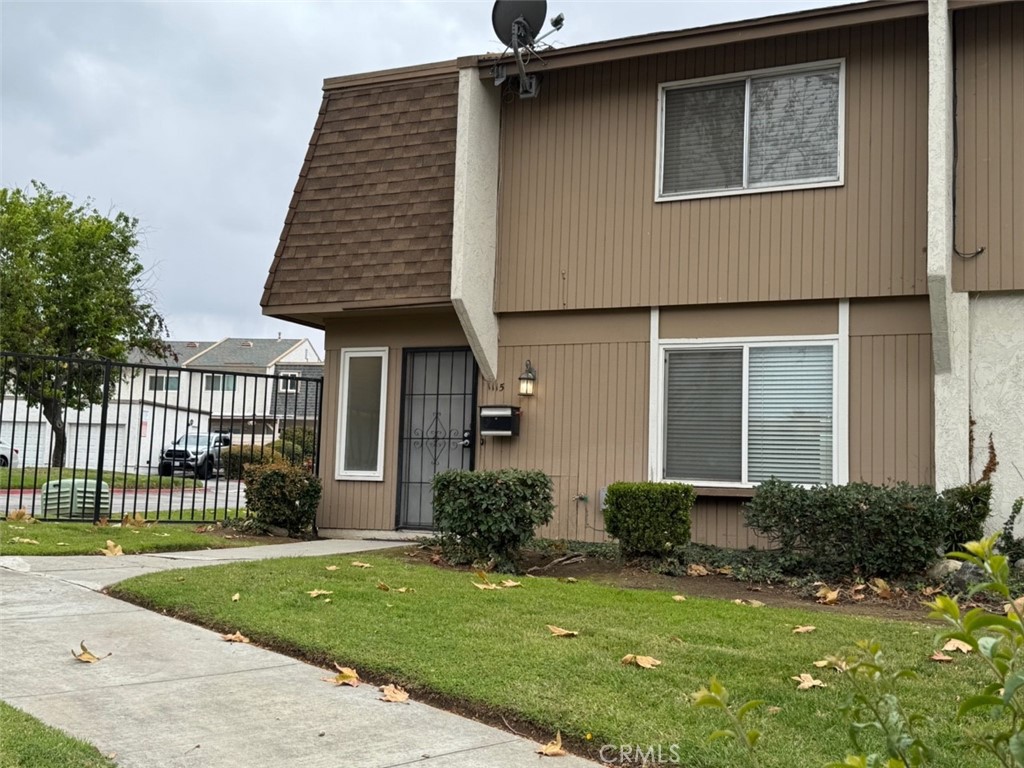1115 Clark Street Riverside, CA 92501 - Photo 19 of 24 a front view of a house with garden