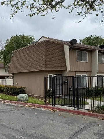 a view of a house with a sink and yard