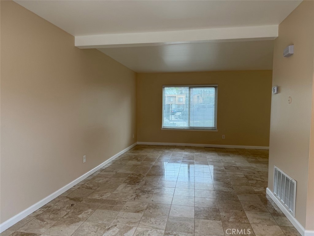 1115 Clark Street Riverside, CA 92501 - Photo 7 of 24 a view of an empty room and window