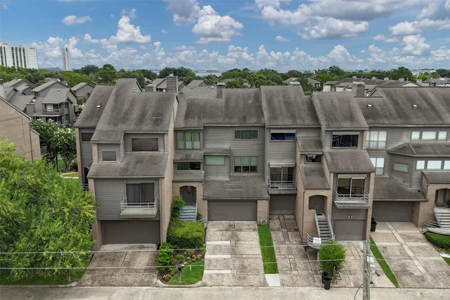 an aerial view of multiple house