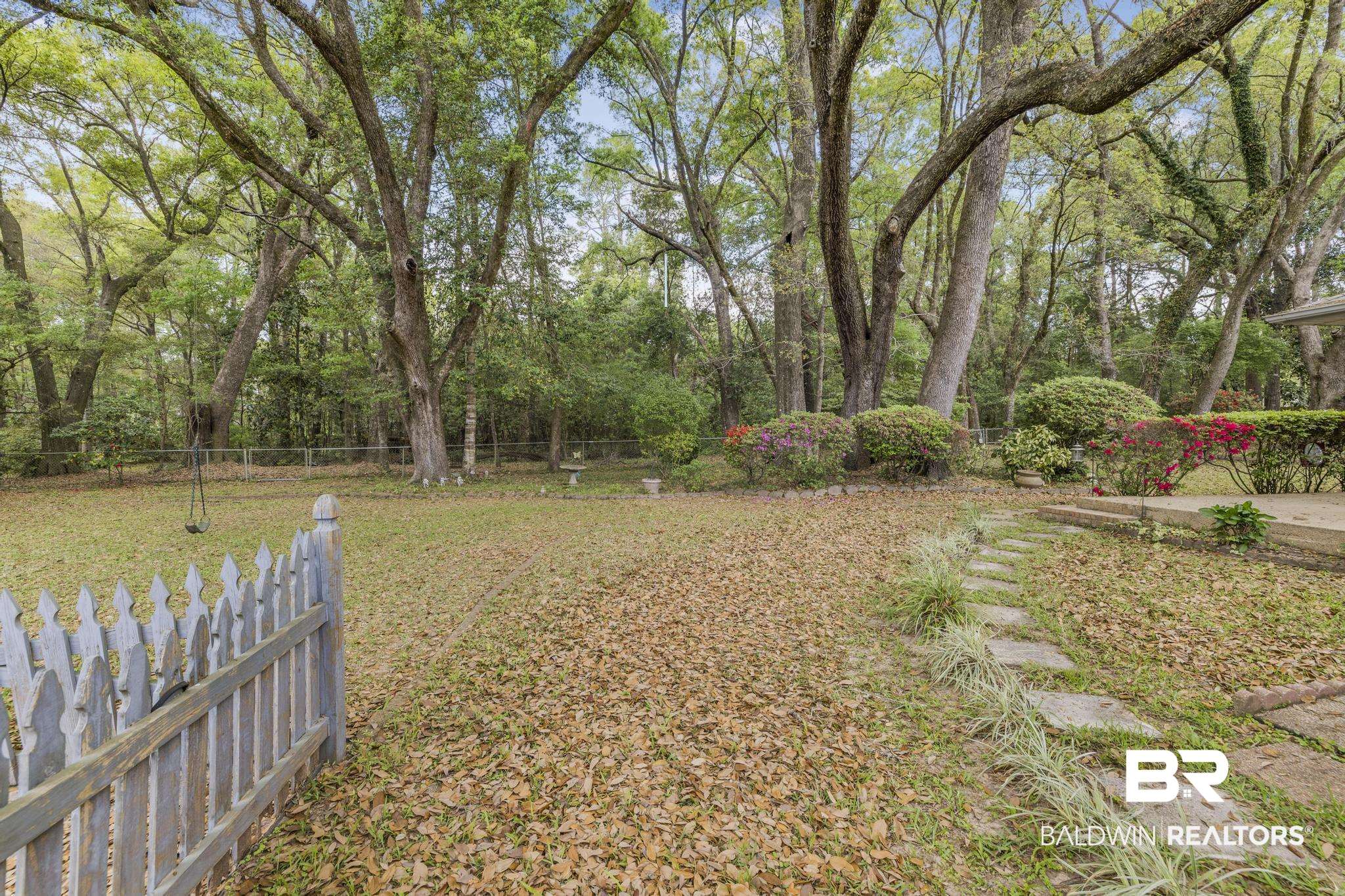 10207 Plantation Drive Daphne, AL 36526 - Photo 13 of 48 View of fenced backyard
