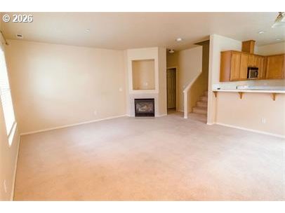 12820 Southwest Dipper Lane, Unit 100 Beaverton, OR 97007 - Photo 3 of 18 a view of a kitchen with a sink