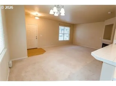 a view of a livingroom with a window