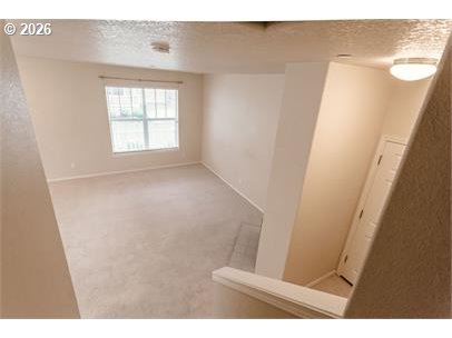 12820 Southwest Dipper Lane, Unit 100 Beaverton, OR 97007 - Photo 9 of 18 a view of an empty room