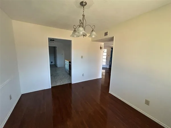 a view of a chandelier in a room
