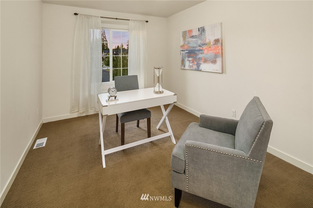3728 224th Street Southeast Bothell, WA 98021 - Photo 15 of 22 a living room with furniture and window