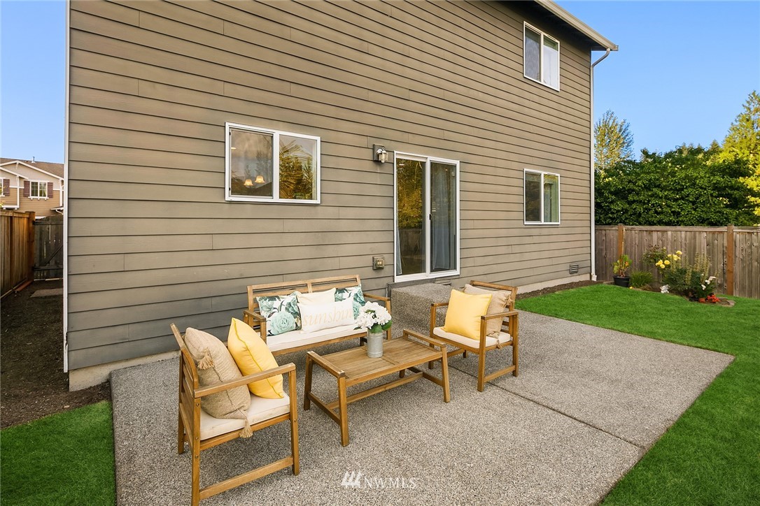 3728 224th Street Southeast Bothell, WA 98021 - Photo 16 of 22 a view of a bench in backyard of the house