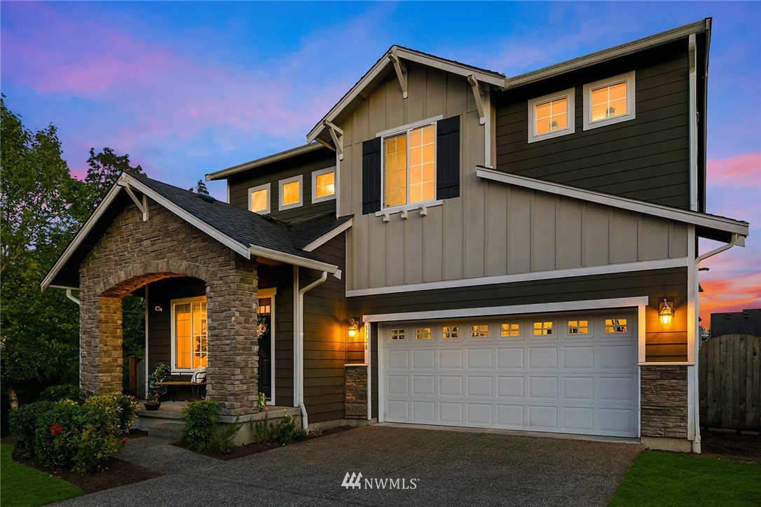 3728 224th Street Southeast Bothell, WA 98021 - Photo 22 of 22 a front view of a house with garden