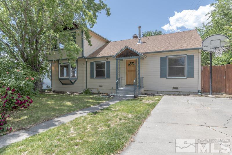 935 Vine Street Reno, NV 89503 - Photo 1 of 18 a front view of house with yard