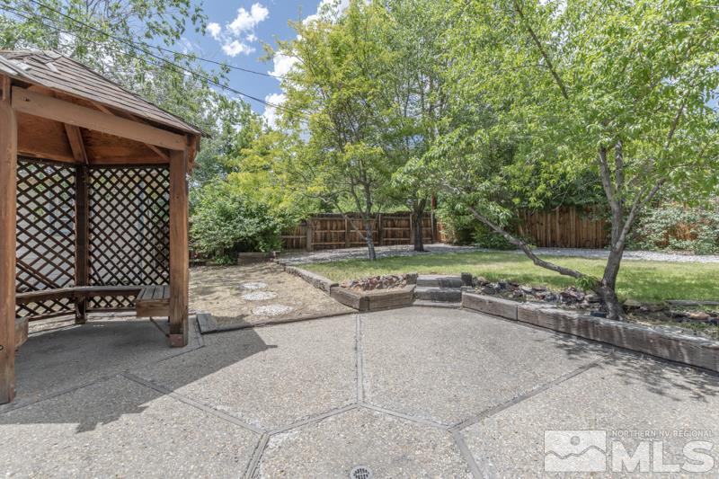 935 Vine Street Reno, NV 89503 - Photo 16 of 18 a backyard of a house with basket ball court