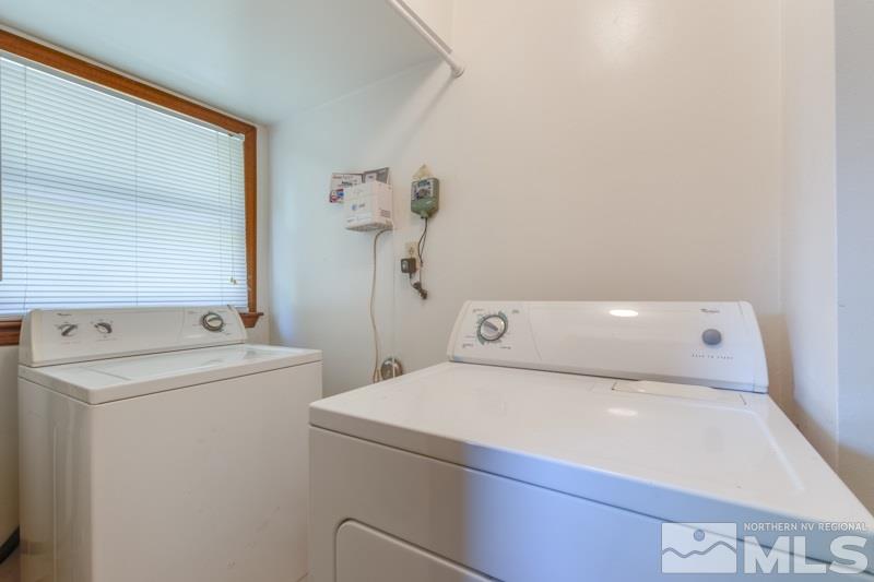 935 Vine Street Reno, NV 89503 - Photo 7 of 18 a utility room with dryer and washer