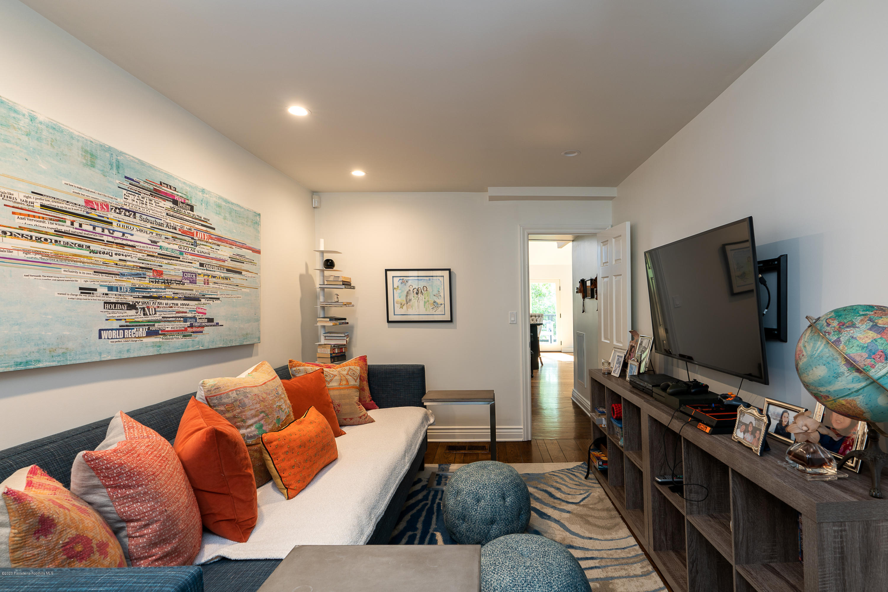 700 Laguna Road Pasadena, CA 91105 - Photo 12 of 31 a living room with furniture and a flat screen tv