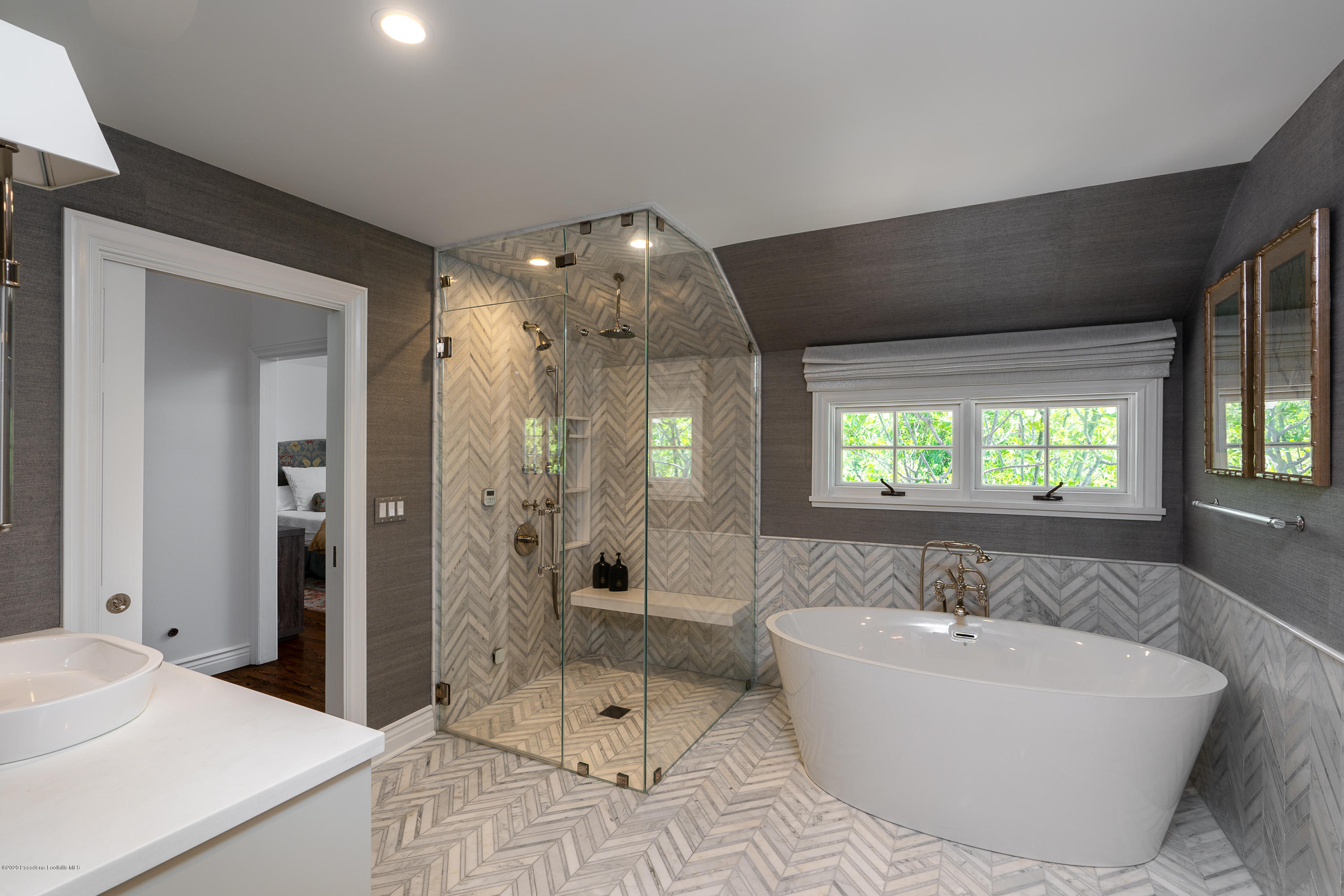 700 Laguna Road Pasadena, CA 91105 - Photo 15 of 31 a spacious bathroom with a bathtub and shower