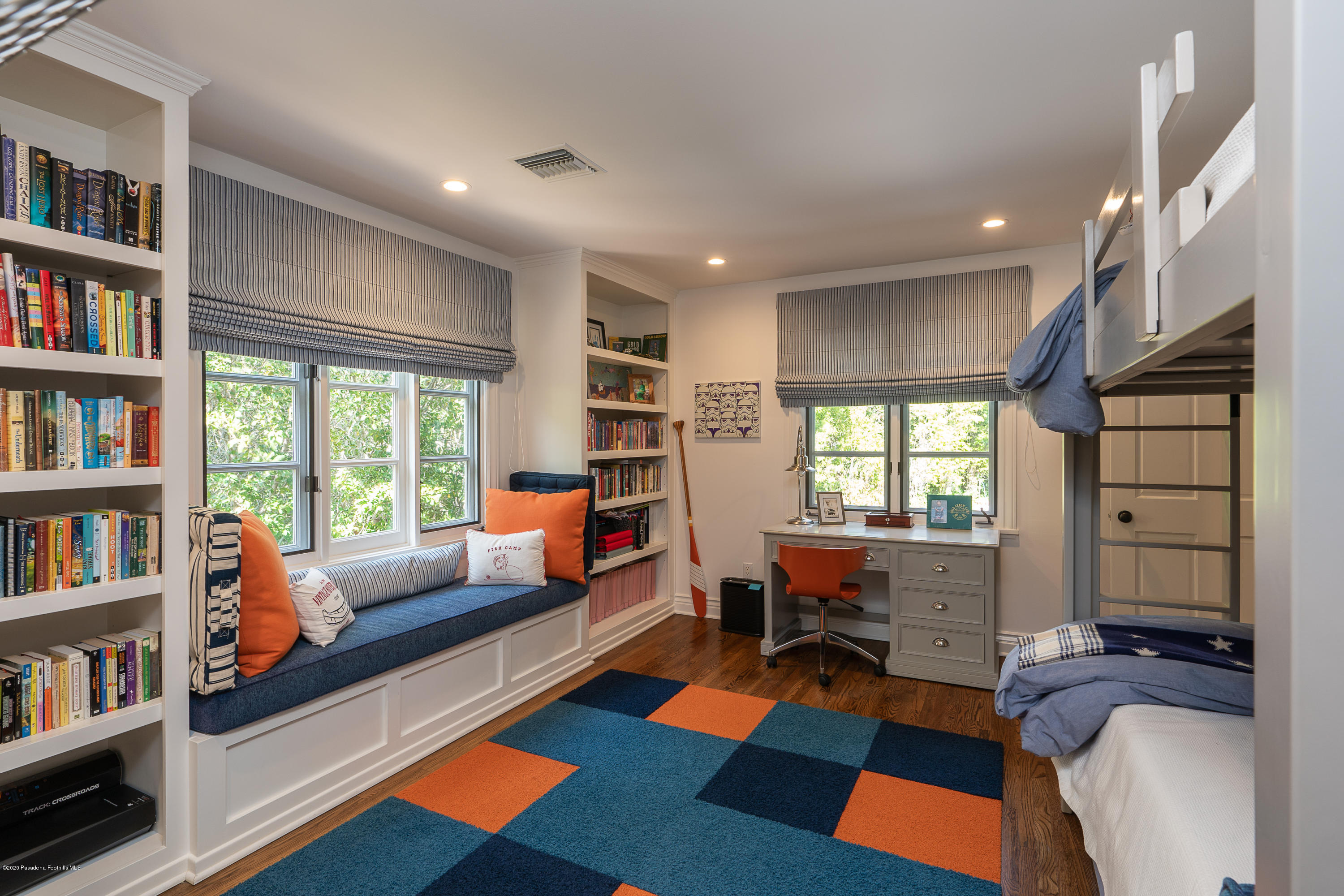 700 Laguna Road Pasadena, CA 91105 - Photo 18 of 31 a living room with furniture and a book shelf