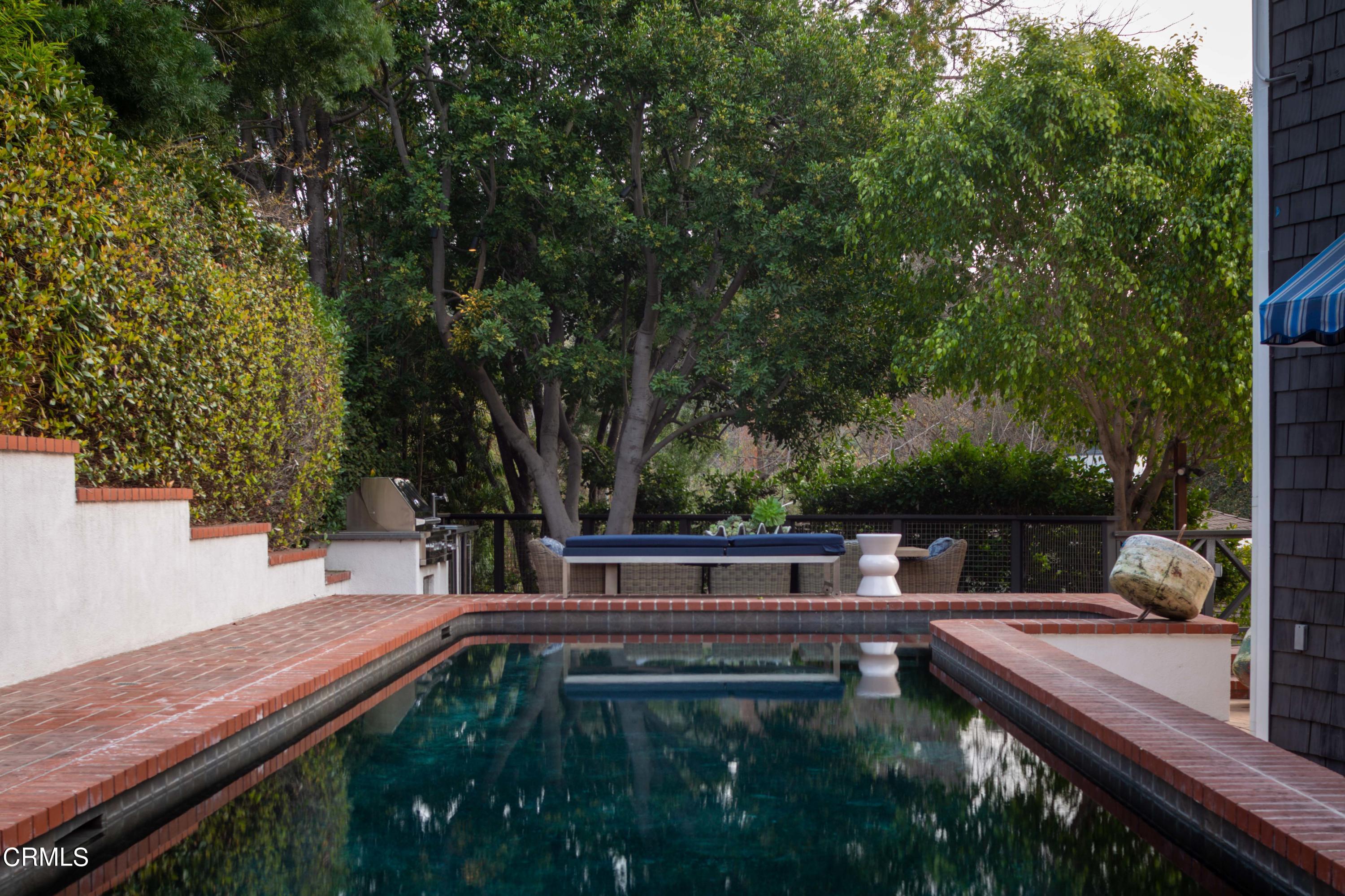 700 Laguna Road Pasadena, CA 91105 - Photo 28 of 31 a backyard view with a sitting space