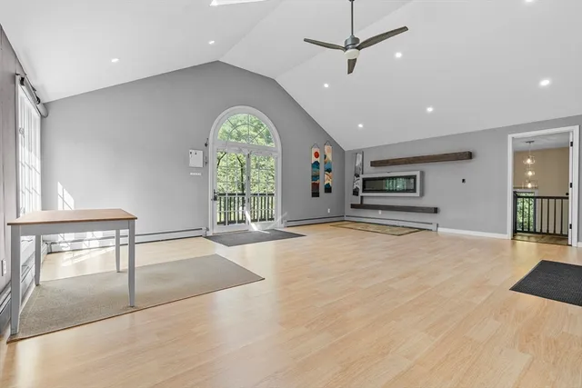 a view of a kitchen with a sink and a window