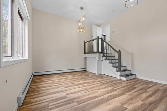 a bedroom with a bed and a desk