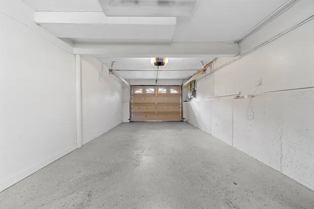 a view of a house with yard and a garden