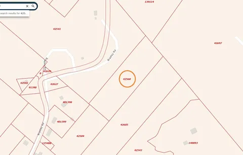 an outdoor space with wooden walls and plants