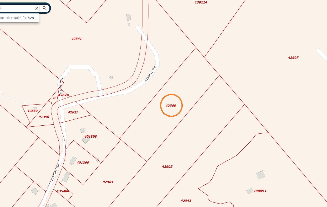 Tbd Bradley Road Coldspring, TX 77331 - Photo 2 of 5 a view of a door with a white house