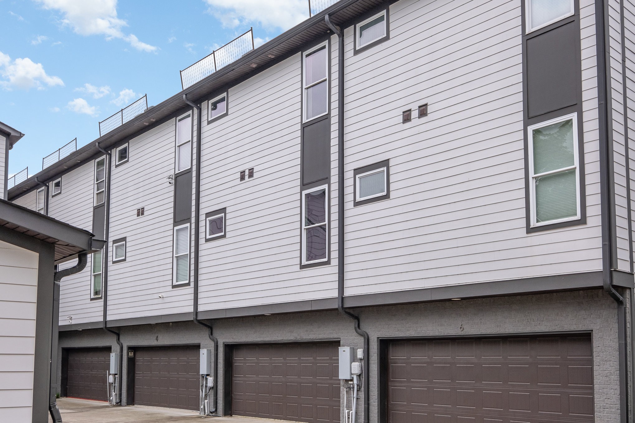 1106 Wade Avenue, Unit 5 Nashville, TN 37203 - Photo 29 of 33 a view of a house with a garage and balcony