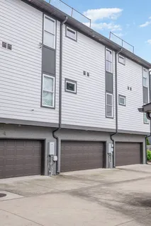 a front view of a house with garage
