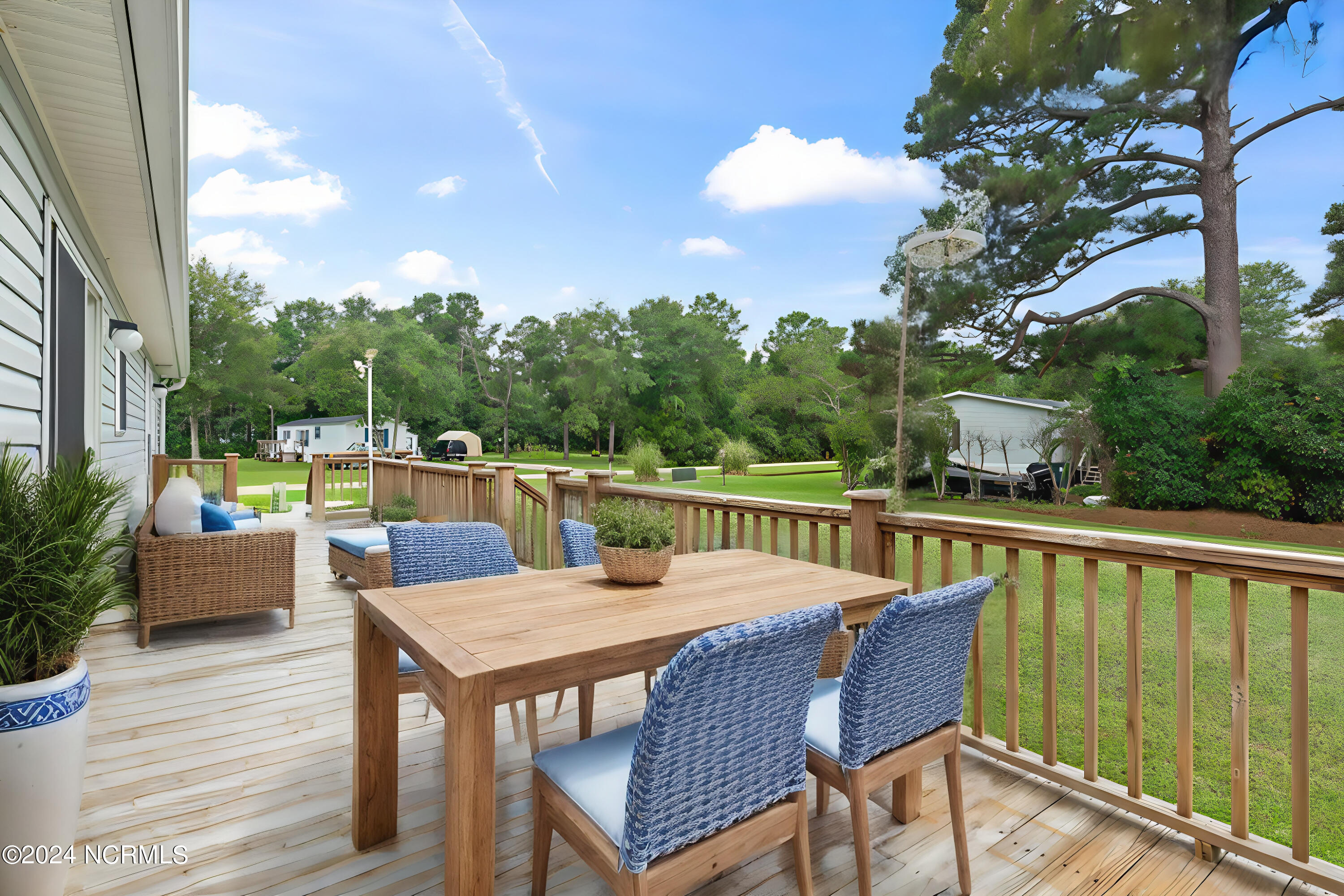5422 Thrush Road Southwest Ocean Isle Beach, NC 28469 - Photo 30 of 40 Virtually staged deck.