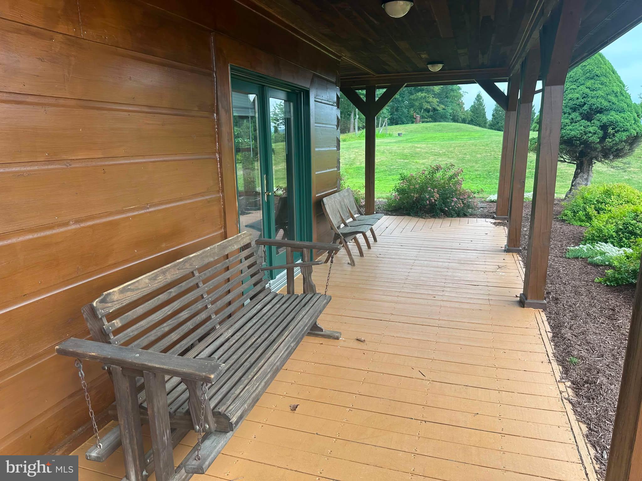 495 Ritchey Road Everett, PA 15537 - Photo 66 of 69 Charming porch with scenic views.