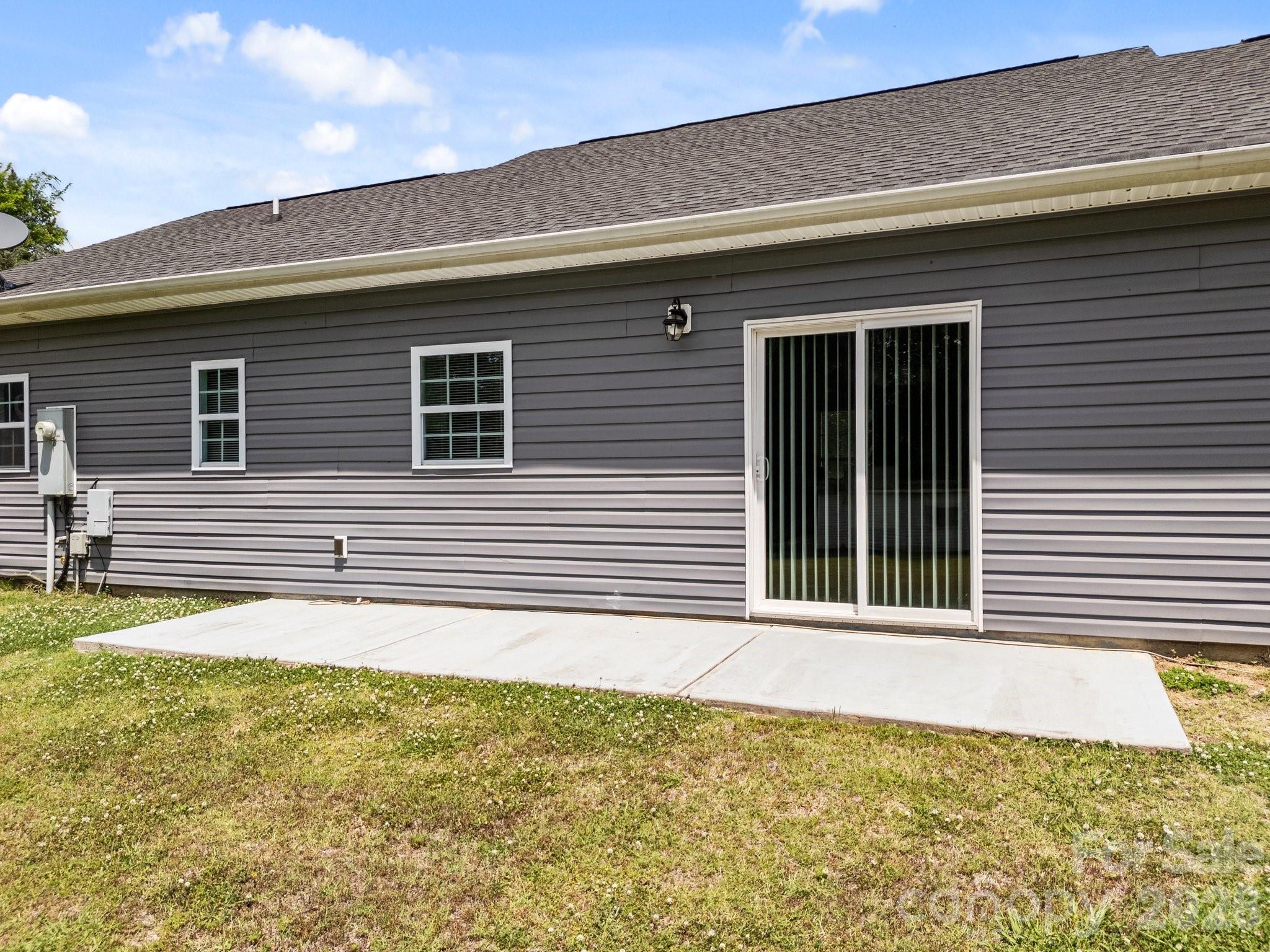 14532 East Rocky River Road Davidson, NC 28036 - Photo 11 of 32 a front view of a house with a yard