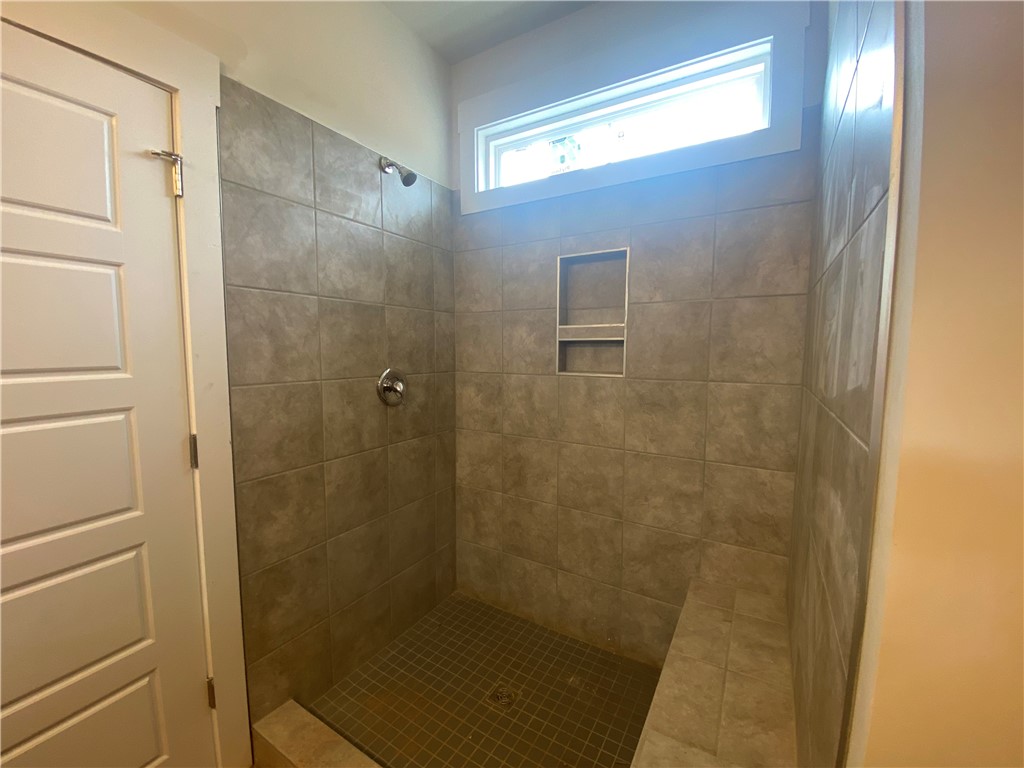 304 Red Oak Court Anderson, SC 29621 - Photo 5 of 7 Walk in Tile Shower with a Bench Seat in en suite.