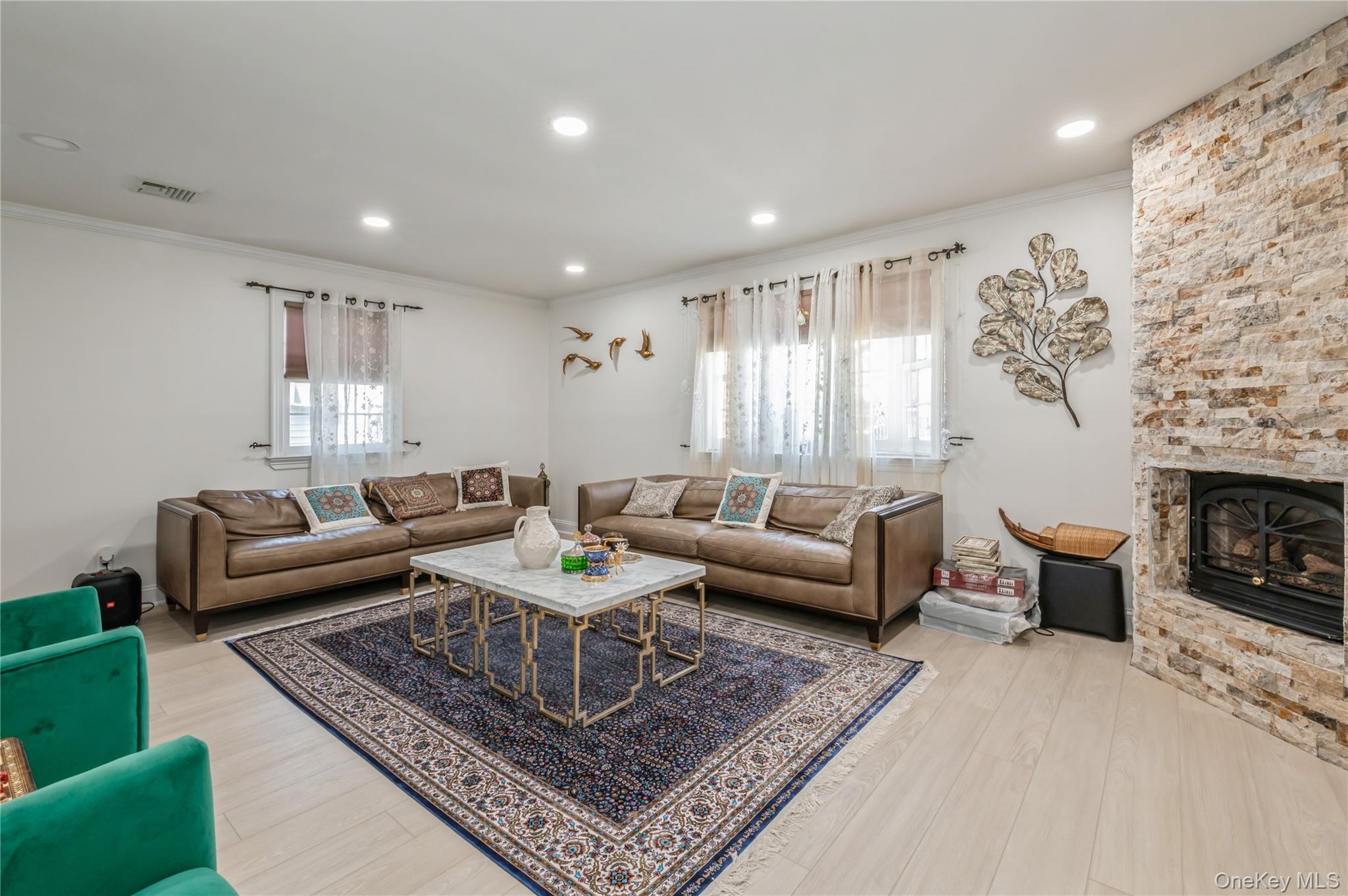 99-78 164th Road Queens, NY 11414 - Photo 4 of 20 a living room with furniture and a fireplace