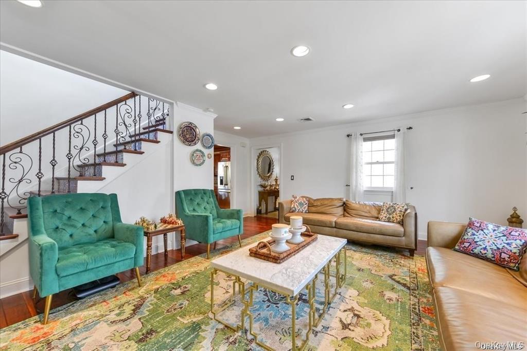 99-78 164th Road Queens, NY 11414 - Photo 5 of 20 a living room with furniture and a table