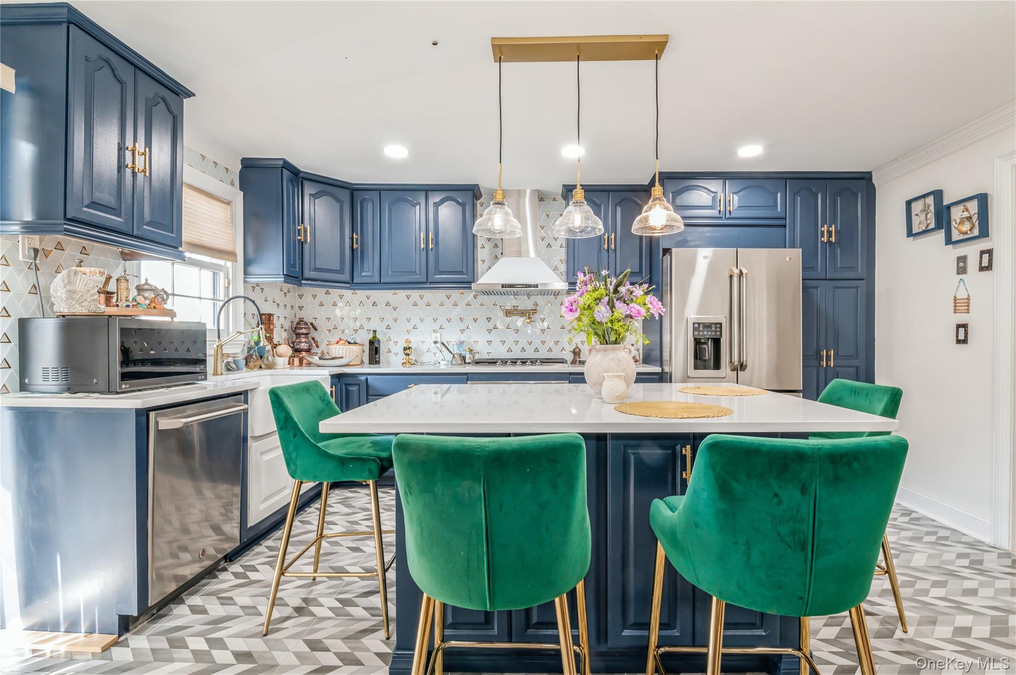99-78 164th Road Queens, NY 11414 - Photo 7 of 20 a kitchen with a table chairs and refrigerator