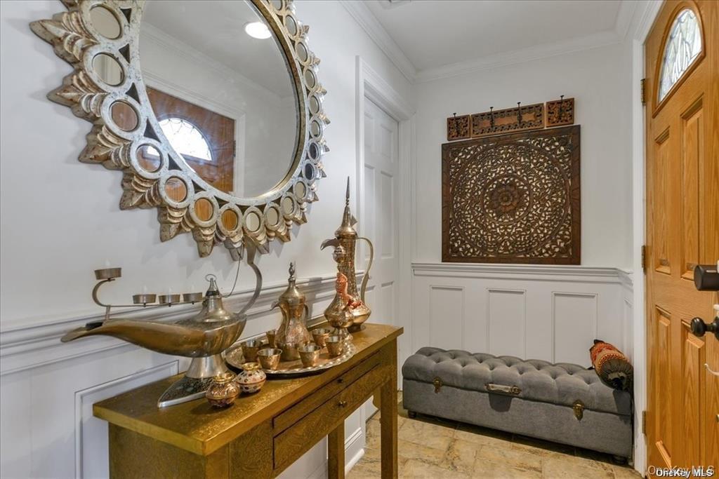 99-78 164th Road Queens, NY 11414 - Photo 9 of 20 a living room with furniture and a mirror