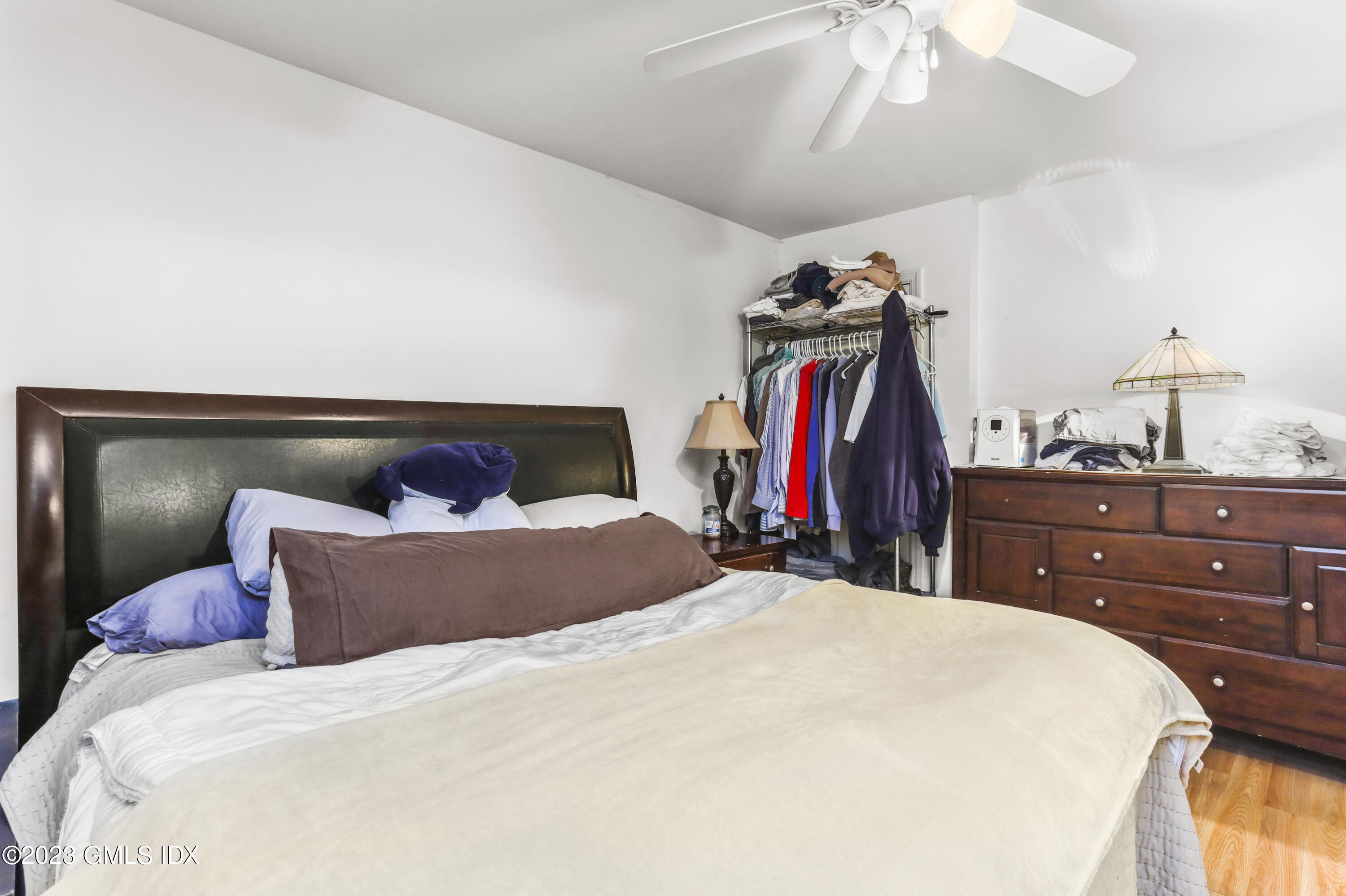 16 Hoover Road Riverside, CT 06878 - Photo 13 of 32 a bed room with a bed and a closet