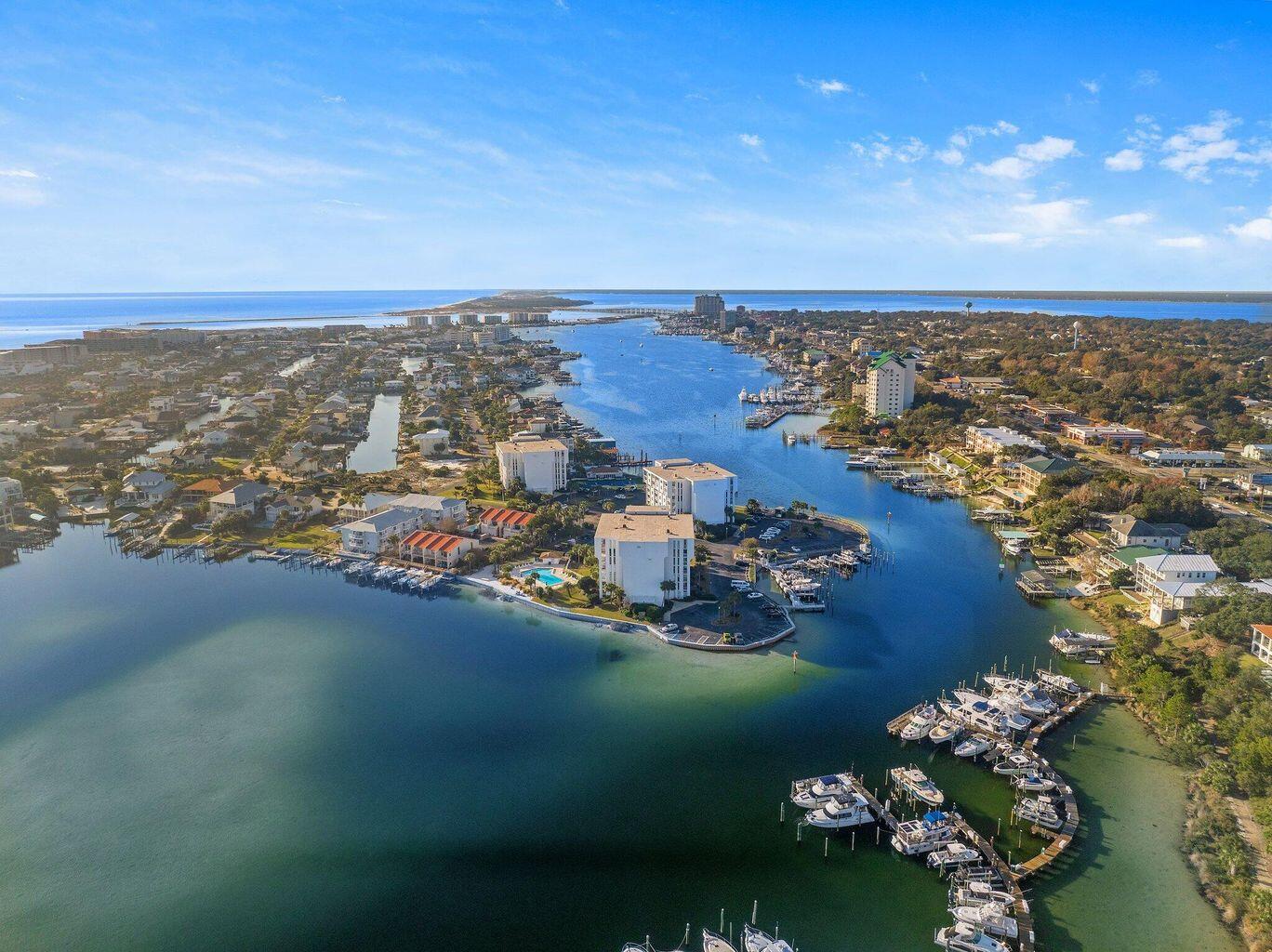 30 Moreno Point Road, Unit 404A Destin, FL 32541 - Photo 32 of 52 an aerial view of multiple house