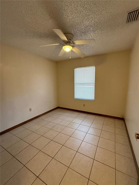 14 Pine Radiel Ocala, FL 34472 - Photo 6 of 10 a view of an empty room and window