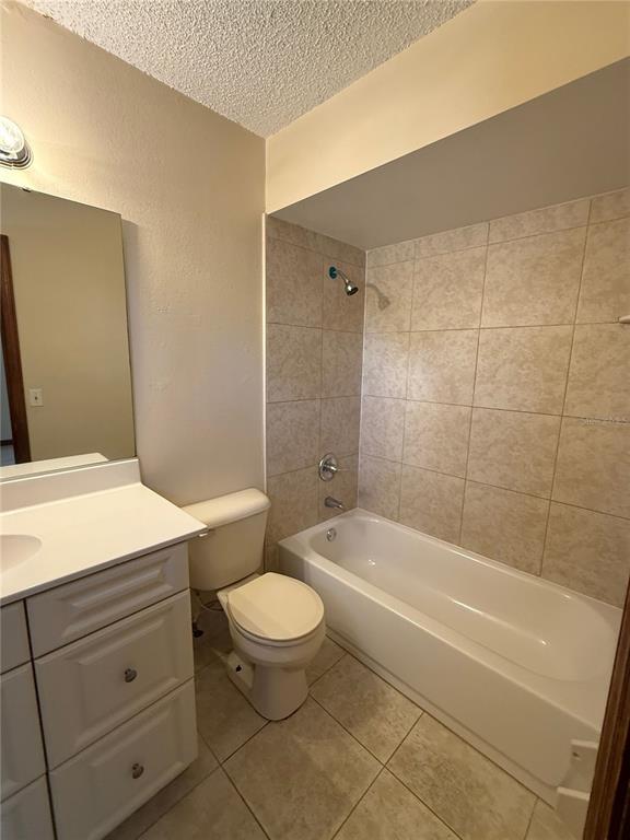 14 Pine Radiel Ocala, FL 34472 - Photo 10 of 10 a bathroom with a granite countertop toilet a sink and bathtub
