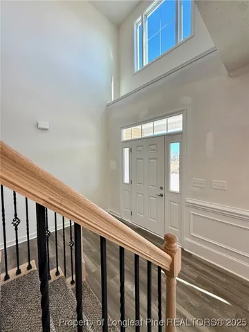 a view of a porch with wooden floor