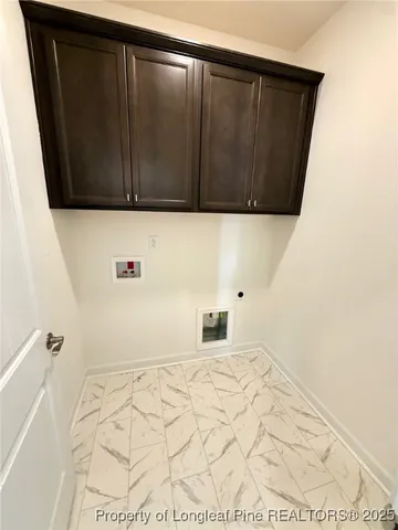 a spacious bathroom with a double vanity sink and a mirror