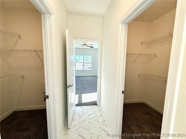 a bathroom with a bathtub and window