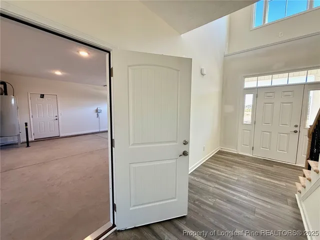 a bathroom with a shower and a sink