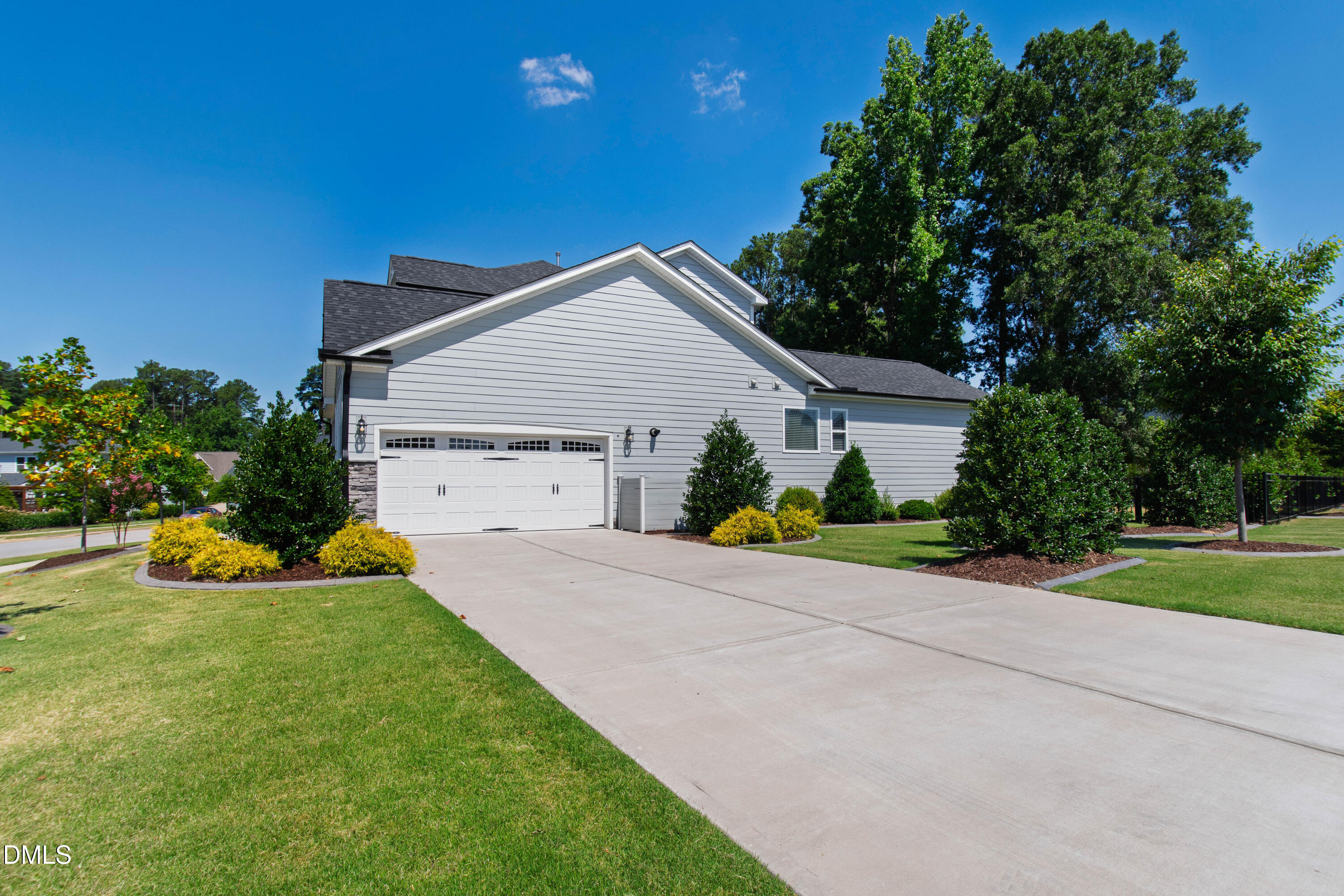 1300 Commons Ford Place Apex, NC 27539 - Photo 63 of 70 a view of a house with backyard and garden
