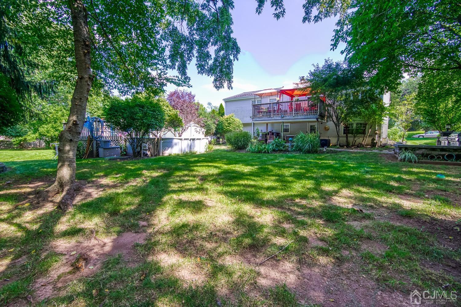 30 Kingsbridge Road Somerset, NJ 08873 - Photo 22 of 23 a view of a house with a yard